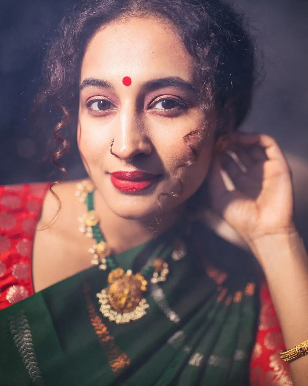 Pooja Ramachandran Stills in Green Saree Red Blouse